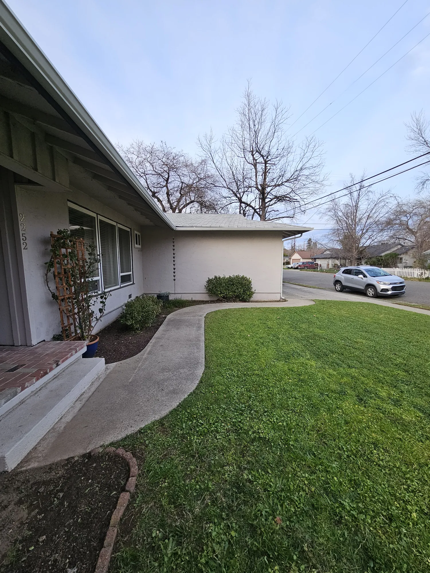 Residential lawn mowed and edged clean